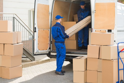 Packing boxes and household items for a move in Lower Morden