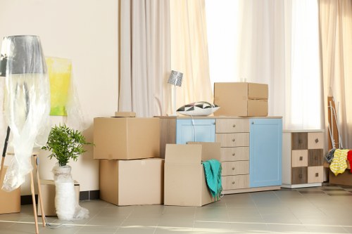 Moving van team preparing equipment for a safe house move
