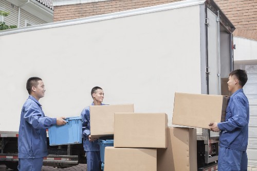 Household items and boxes prepared for a home removal in Lower Morden