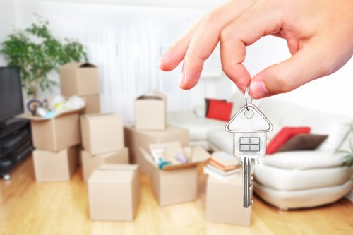 Office furniture and equipment being prepared for commercial removals in Lower Morden