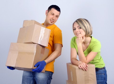 Packed boxes and furniture ready for transport in Lower Morden