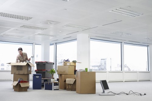 Packed moving boxes and furniture ready for transport
