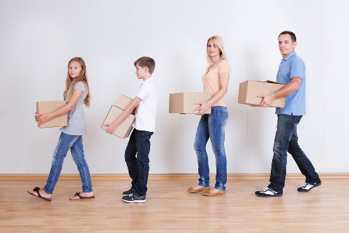 Packing boxes and furniture for a local move in Lower Morden